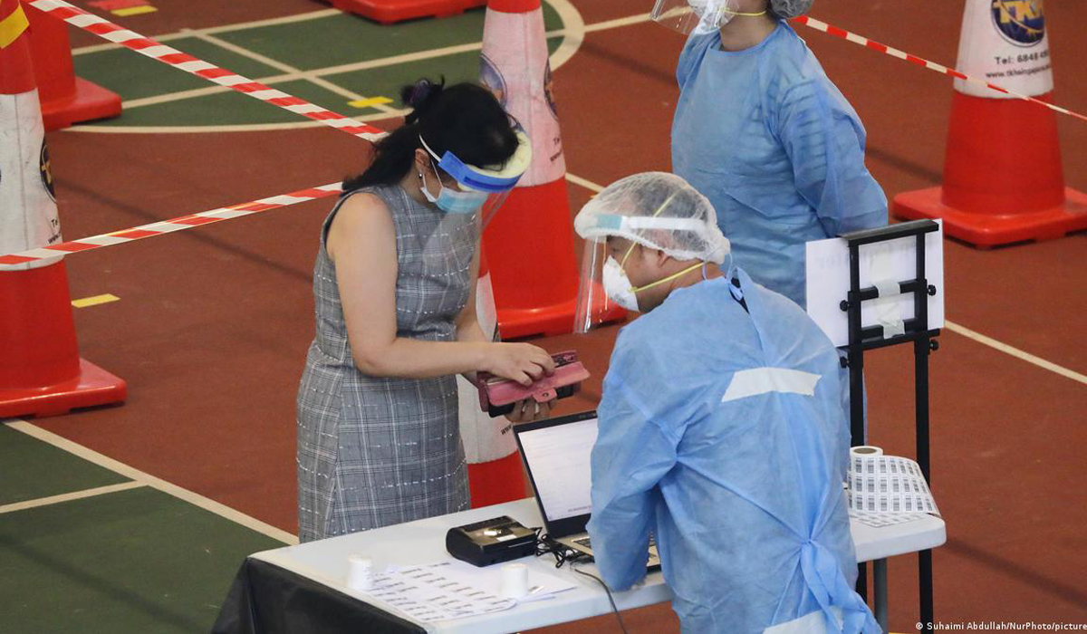 Singapore fully vaccinates 80% of population against COVID-19